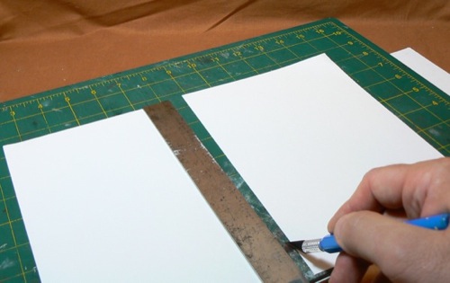 Photograph of cutting Bristol Board for the 
HO scale metal roofing