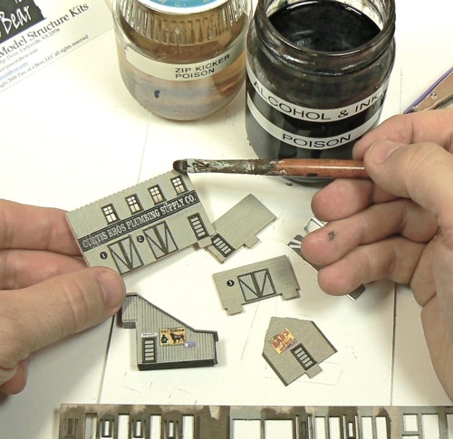 Adding some weathering to the Curtis Bros. Plumbing Supply Co Z-scale model railroad kit