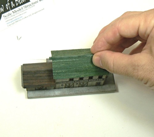 Adding the shingles and tarpapr to the Curtis Bros. Plumbing Supply Co Z-scale model railroad kit