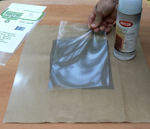 Photograph of dropping styrene in place